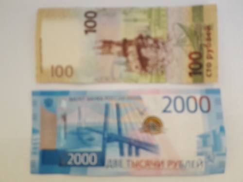 Банкноты новые номинал 100 и 2000 рублей
