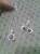 Гарнитур серебро 295, фианиты и и синтетический рубин. Серьги, кольцо, кулон