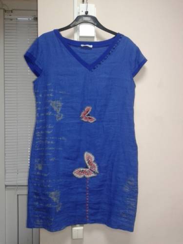 Продам новое платье синего цвета с бабочкой.