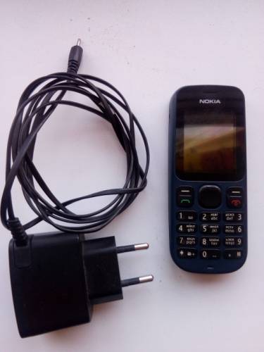 моб.телефон Nokia-100.зарядка моб.телефон Nokia-100