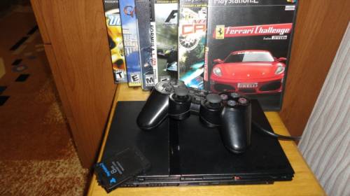 Продам  игровую приставку SONY PlayStation 2 