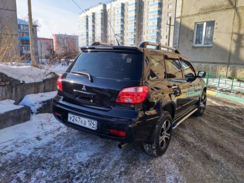  › Модель ­ Mitsubishi Outlander