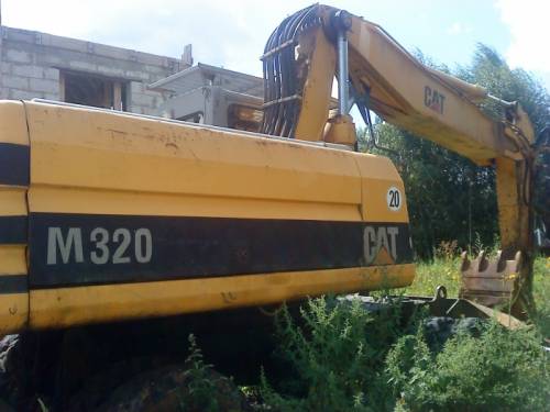 Продается колесный экскаватор Caterpillar Cat 320 DL