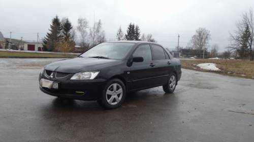  › Модель ­ Mitsubishi Lancer