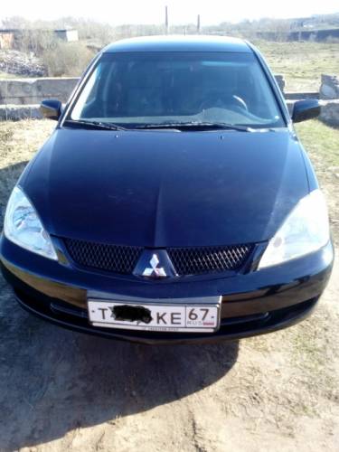  › Модель ­ Mitsubishi Lancer