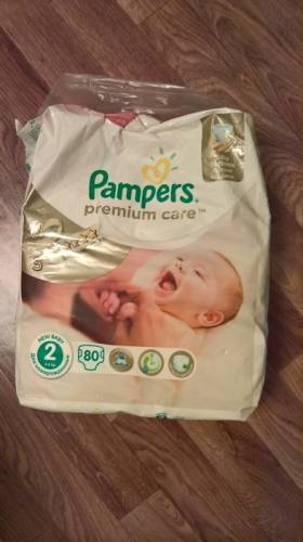 продам подгузники pampers premium  care