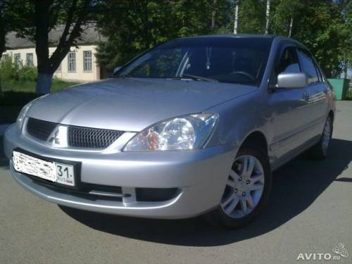  › Модель ­ Mitsubishi Lancer