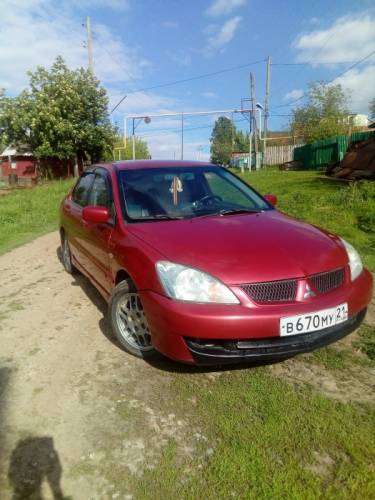  › Модель ­ Mitsubishi Lancer