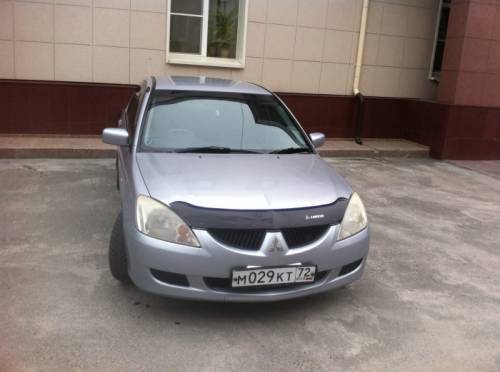  › Модель ­ Mitsubishi Lancer